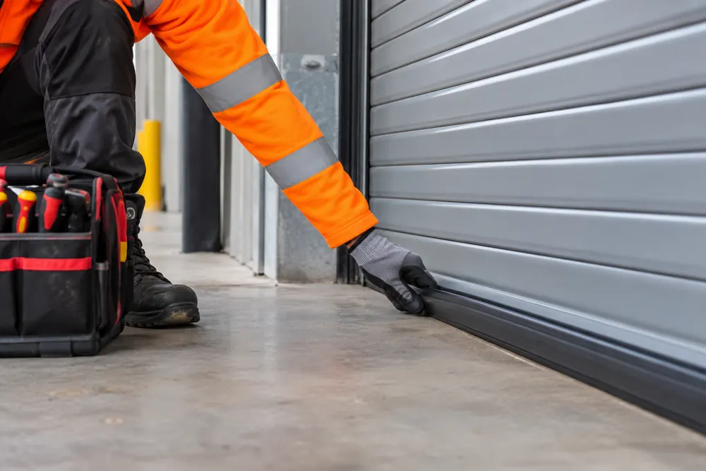 Safety-edge inspection on an industrial shutter serving Glasgow commercial premises